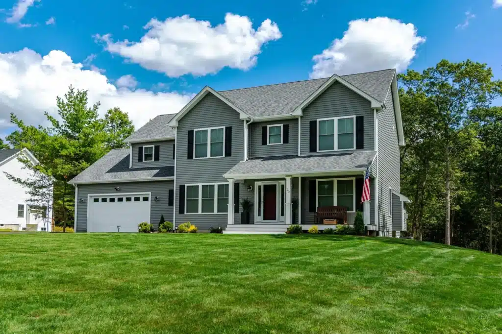 Modern custom home showcasing energy efficiency features like solar panels and energy-efficient windows